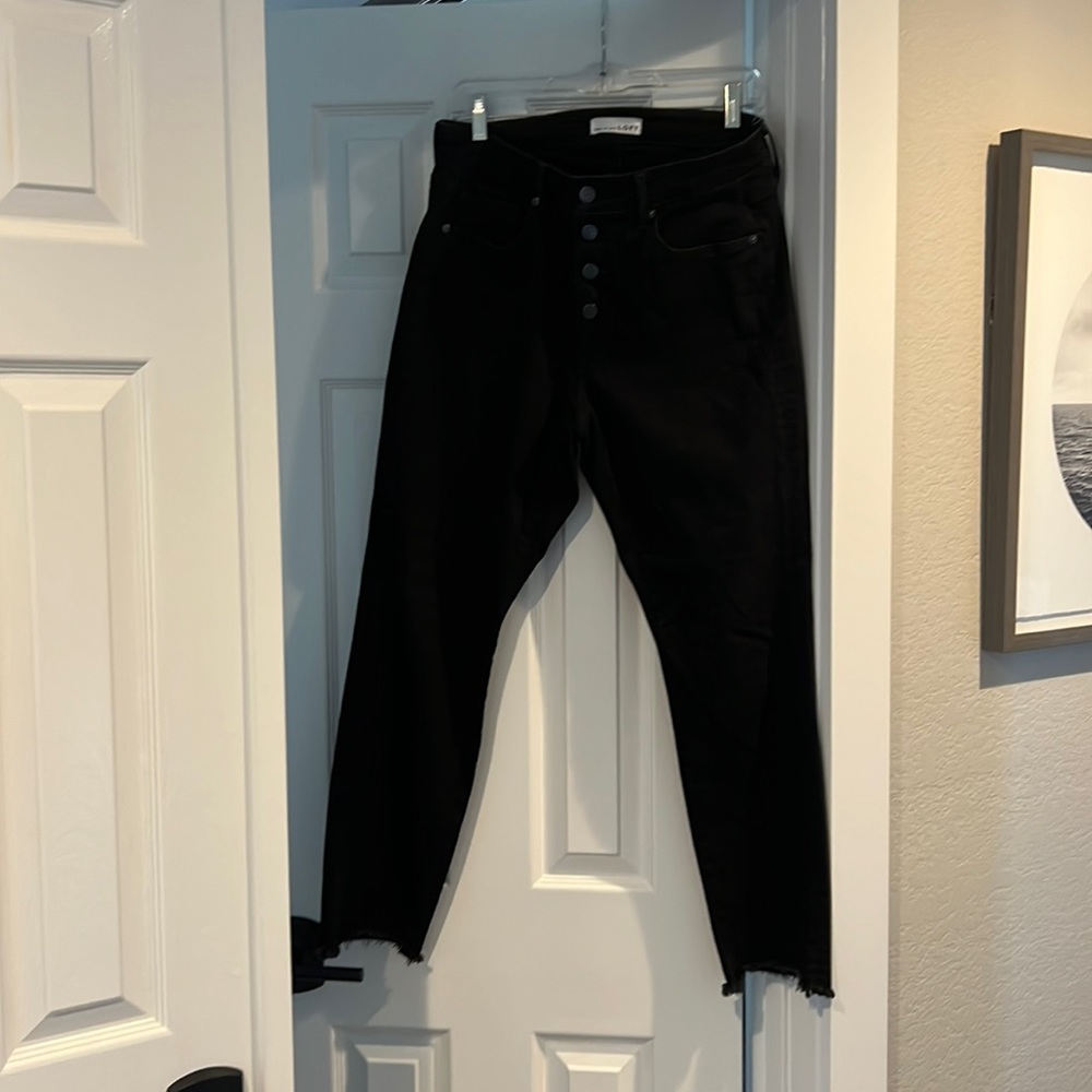NWOT black frayed bottom jeans